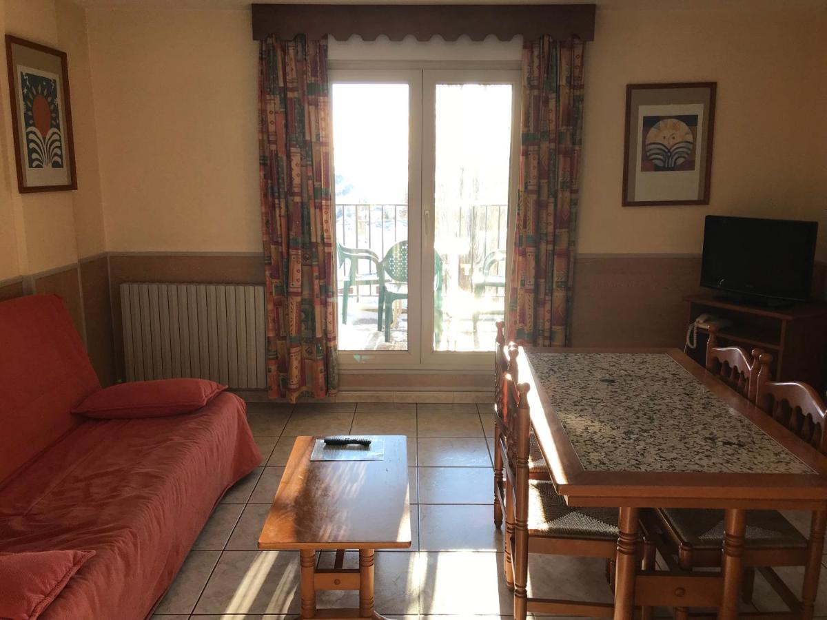 Coin salon dans l'établissement Hotel et Résidence Le Clos Cerdan