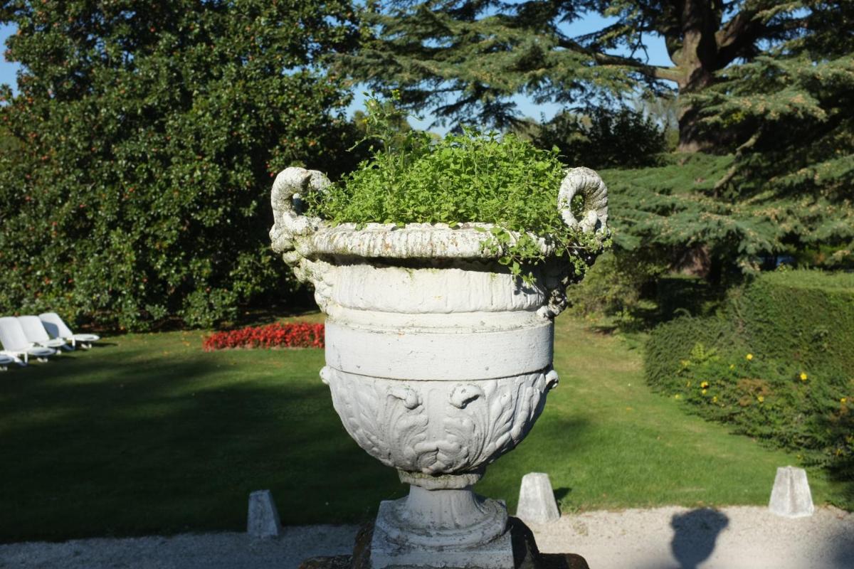 Jardin de l'établissement Château de Beaulieu et Magnolia Spa, The Originals Relais
