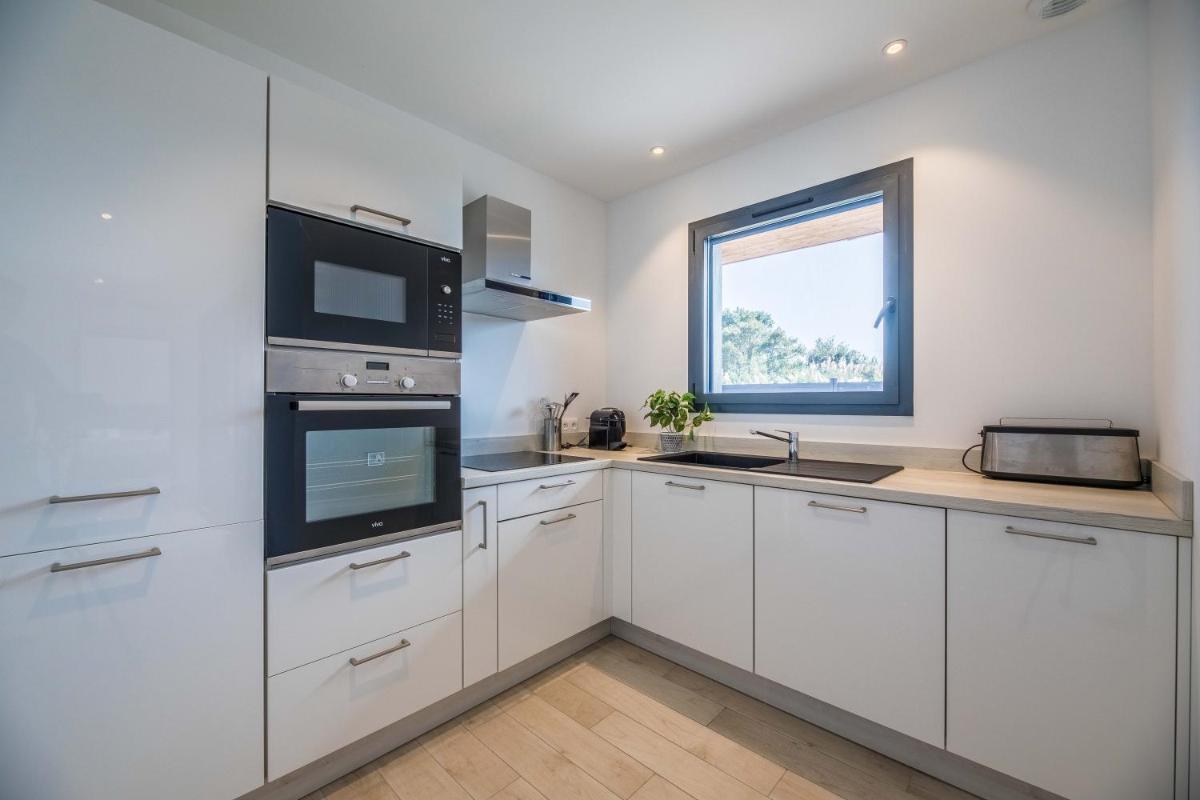 Cuisine ou kitchenette dans l'établissement Résidence Pierre & Vacances Premium Vesna Rossa