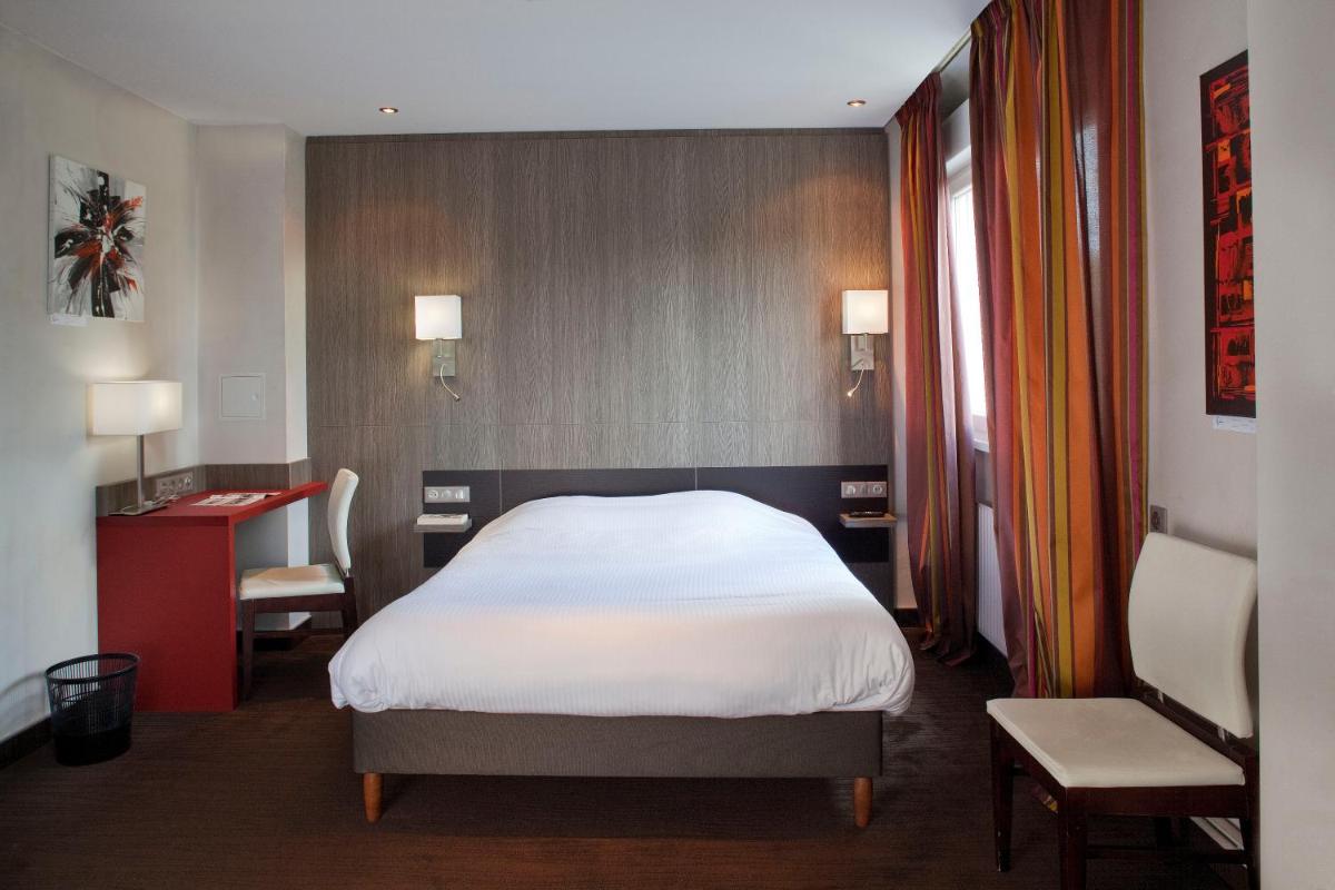 Un ou plusieurs lits dans un hébergement de l'établissement Europe Haguenau – Hotel & Spa