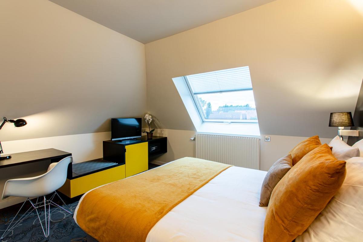 Un ou plusieurs lits dans un hébergement de l'établissement Europe Haguenau – Hotel & Spa