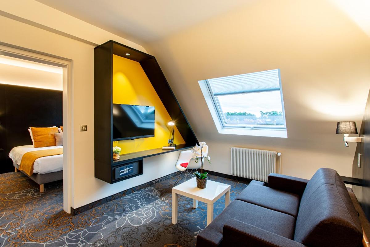 Un ou plusieurs lits dans un hébergement de l'établissement Europe Haguenau – Hotel & Spa