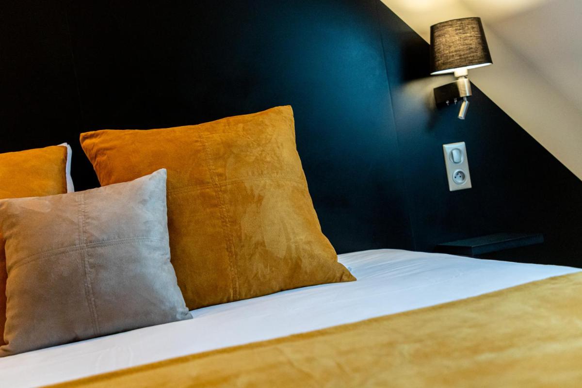 Un ou plusieurs lits dans un hébergement de l'établissement Europe Haguenau – Hotel & Spa