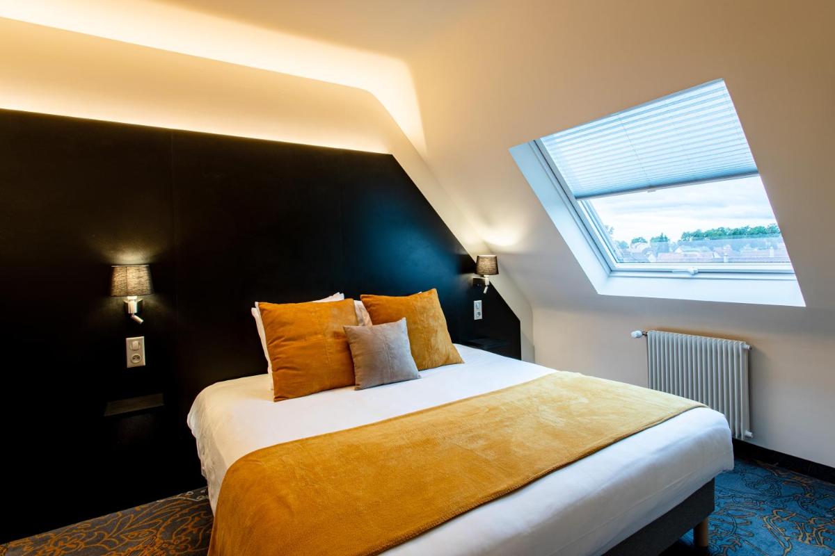 Un ou plusieurs lits dans un hébergement de l'établissement Europe Haguenau – Hotel & Spa