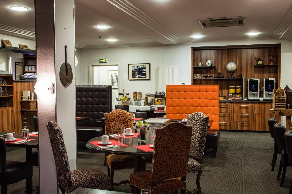 Coin salon dans l'établissement Europe Haguenau – Hotel & Spa