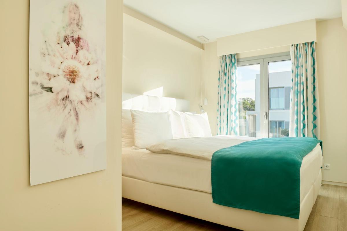Cama o camas de una habitación en 7Pines Resort Ibiza, part of Destination by Hyatt