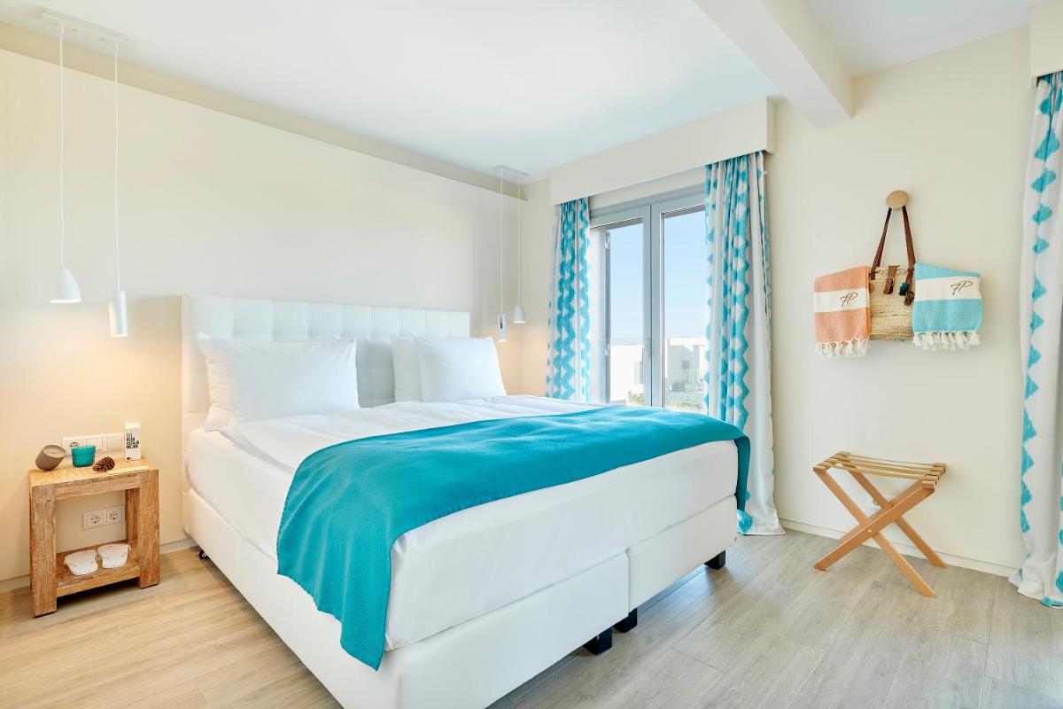 Cama o camas de una habitación en 7Pines Resort Ibiza, part of Destination by Hyatt