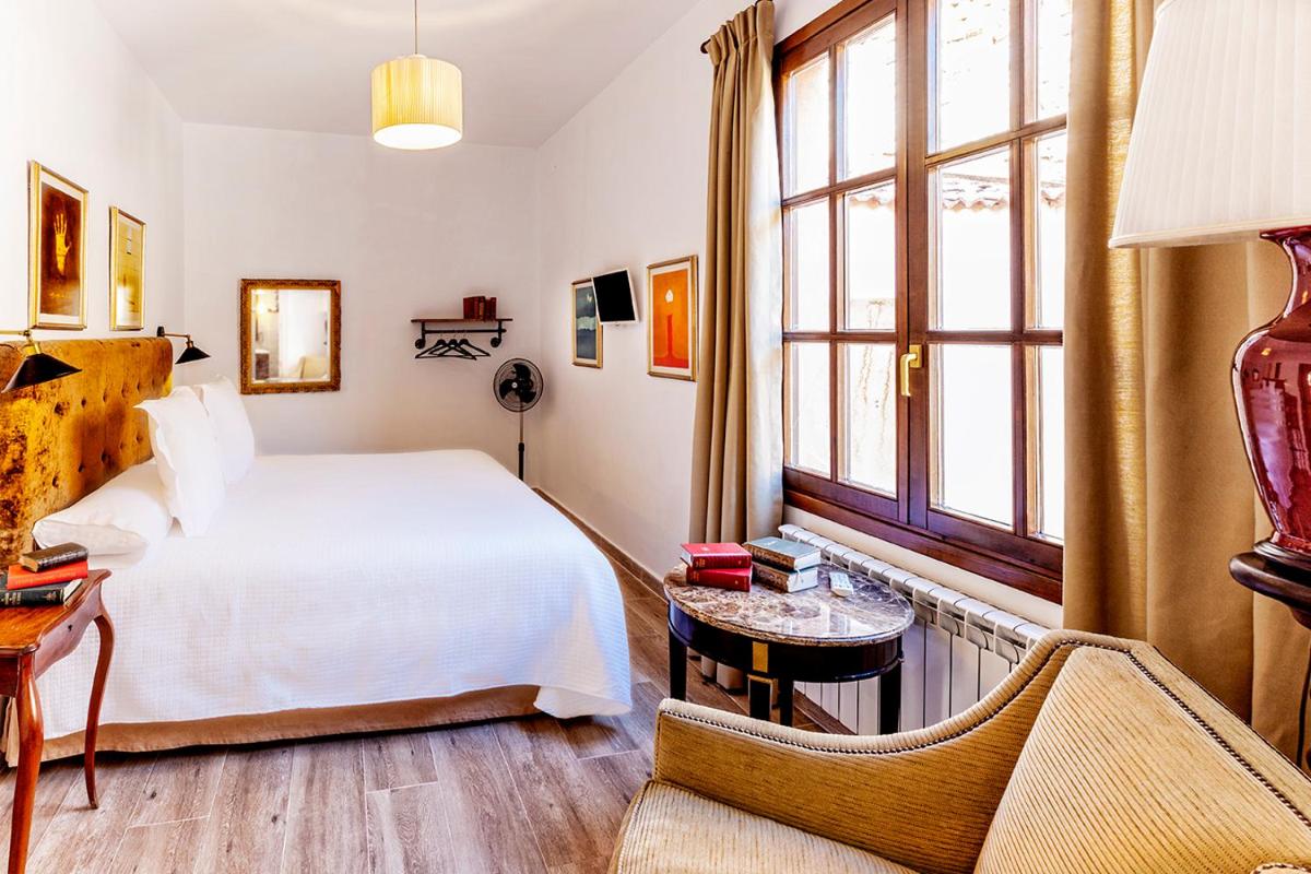 Cama o camas de una habitación en Hotel Spa Salinas de Imón