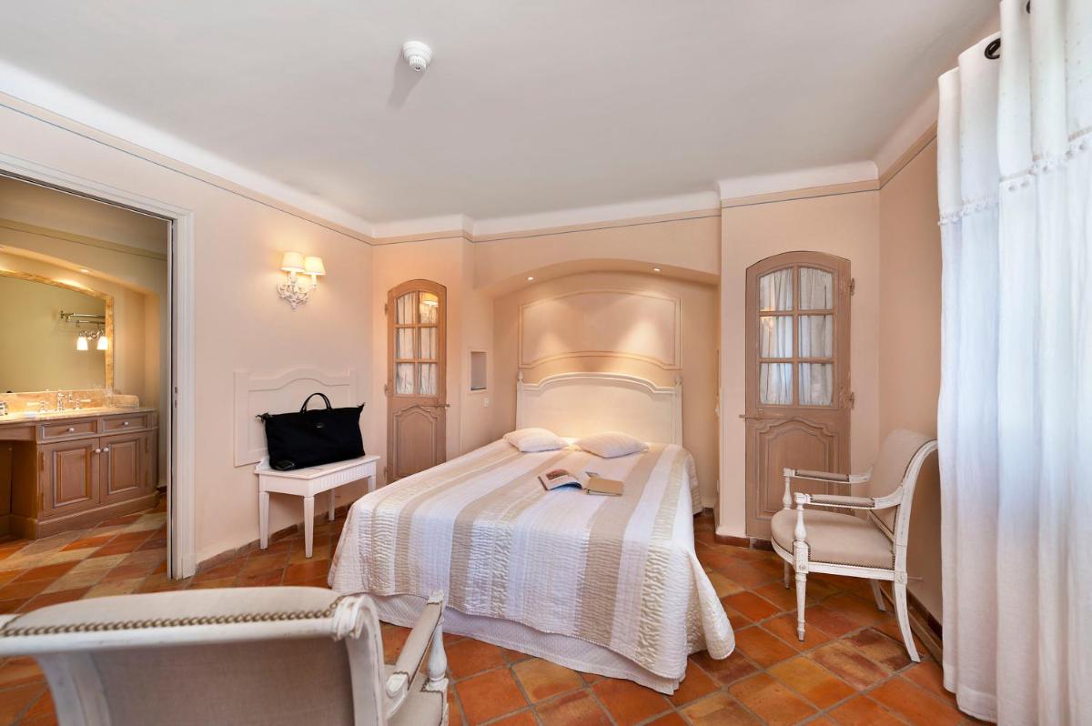 Un ou plusieurs lits dans un hébergement de l'établissement Bastide Saint Antoine - Relais & Châteaux
