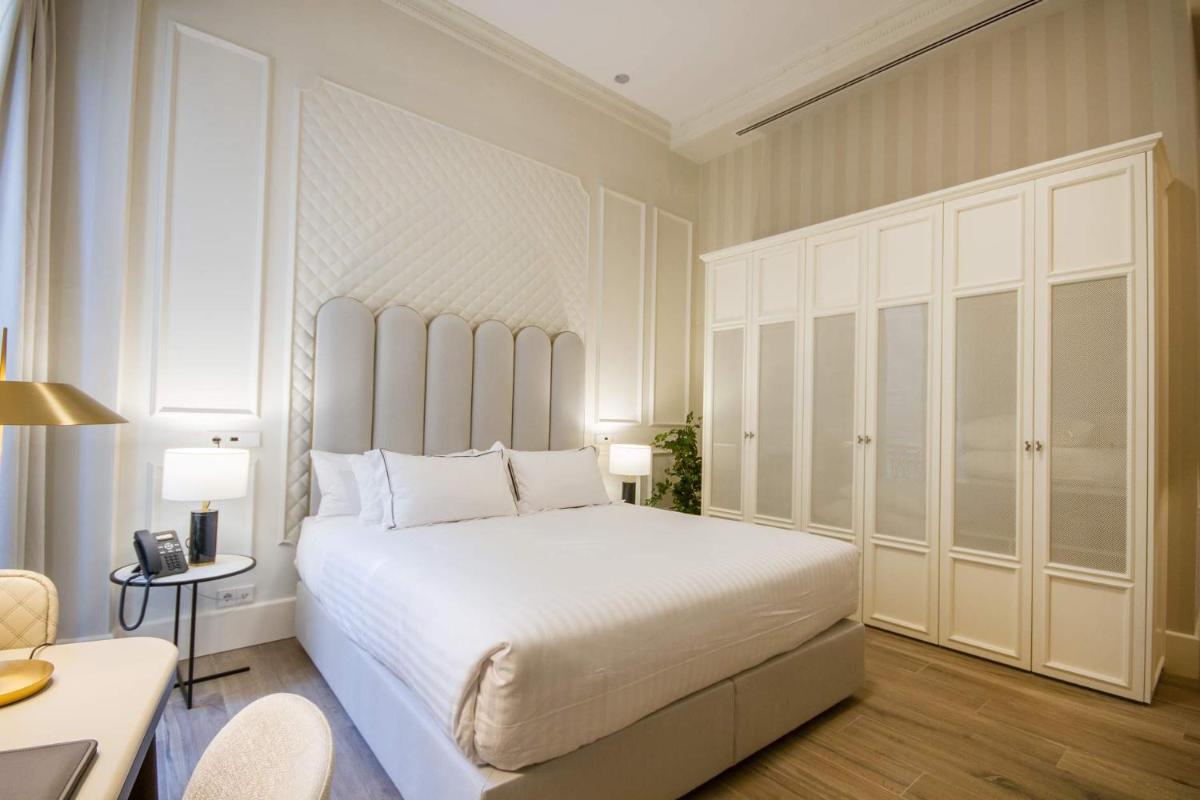 Cama o camas de una habitación en MYR Palacio Vallier