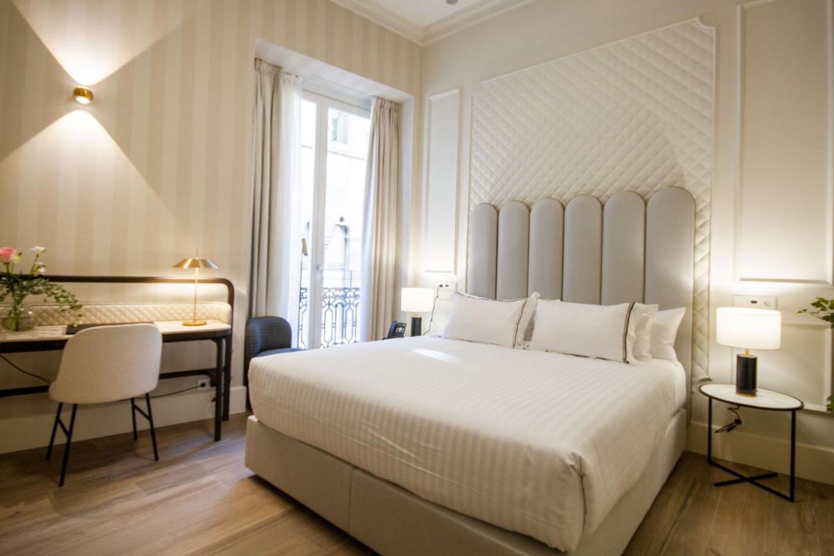 Cama o camas de una habitación en MYR Palacio Vallier