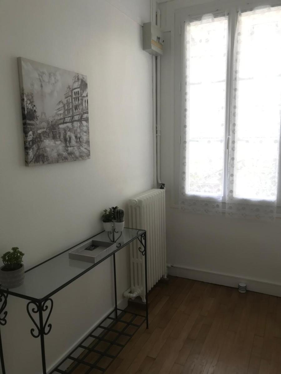 Très bel appartement de style ancien avec sa terrasse en bois en coeur de ville - Housity