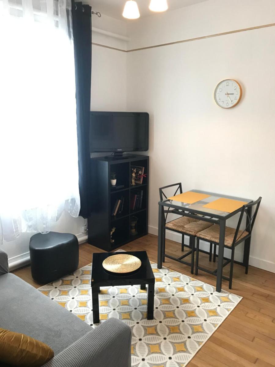 Très bel appartement de style ancien avec sa terrasse en bois en coeur de ville - Housity