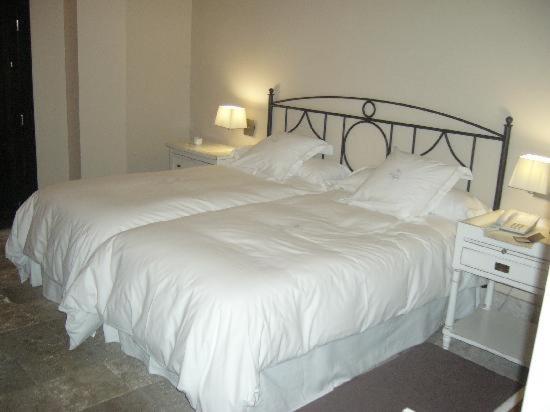 Cama o camas de una habitación en Hotel Palacio de Mengibar