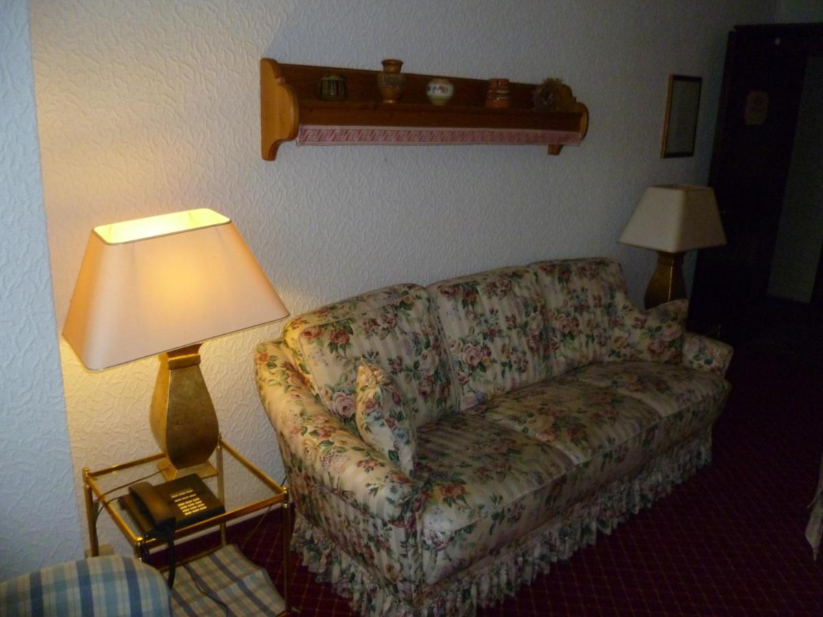 Ein Sitzbereich in der Unterkunft Wellness und Romantik Hotel Helmboldt
