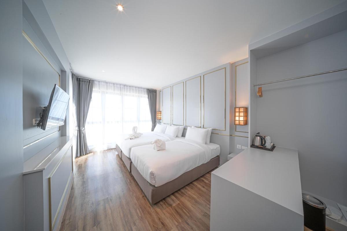 The Wing Boutique Hotel - Housity