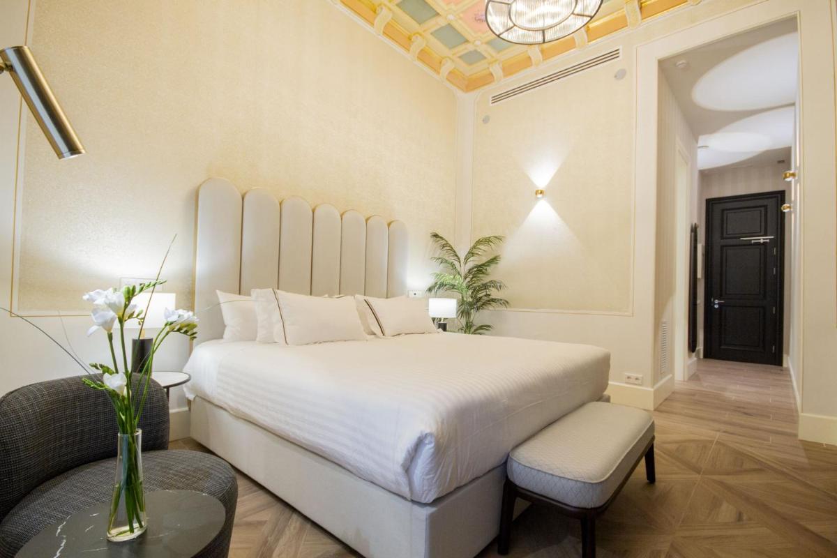 Cama o camas de una habitación en MYR Palacio Vallier
