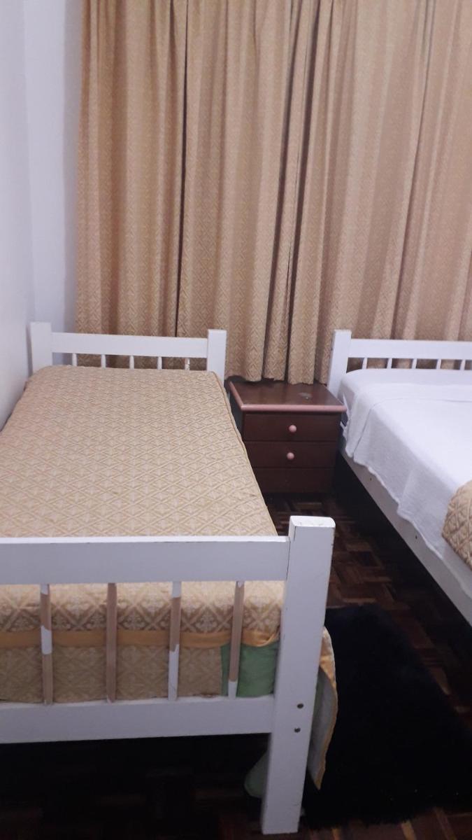 Casa com garagem em condomínio - Housity
