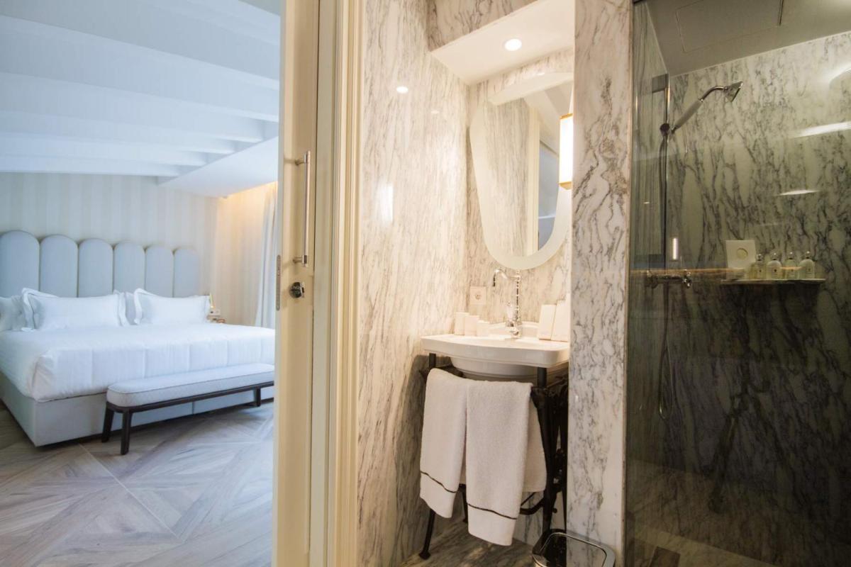 Cama o camas de una habitación en MYR Palacio Vallier