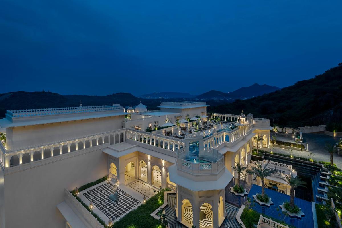 an aerial view of a building at night at Aurika, Udaipur - Luxury by Lemon Tree Hotels in Udaipur