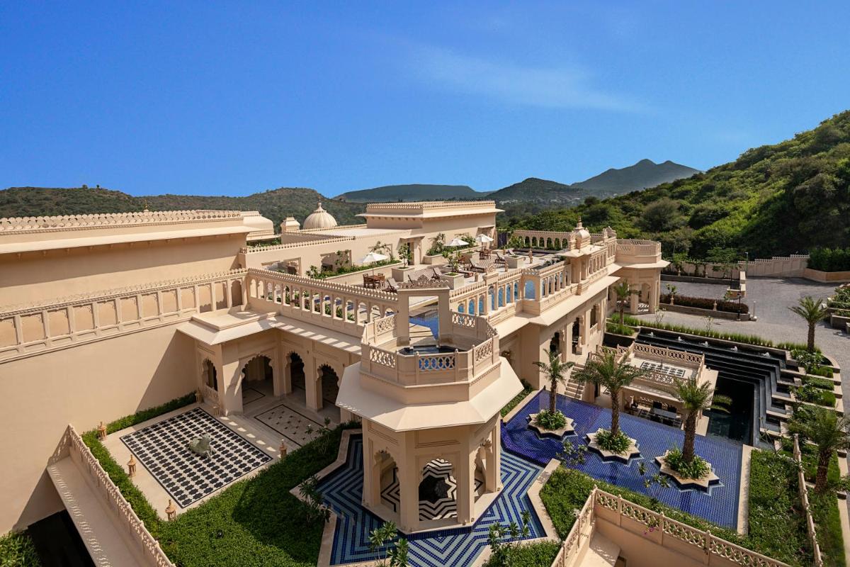 an aerial view of a building with a balcony at Aurika, Udaipur - Luxury by Lemon Tree Hotels in Udaipur