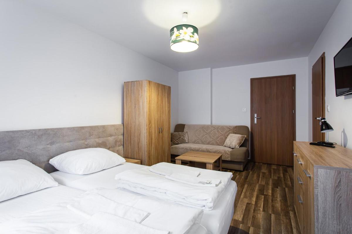 Pokoje Gold Centrum - Housity