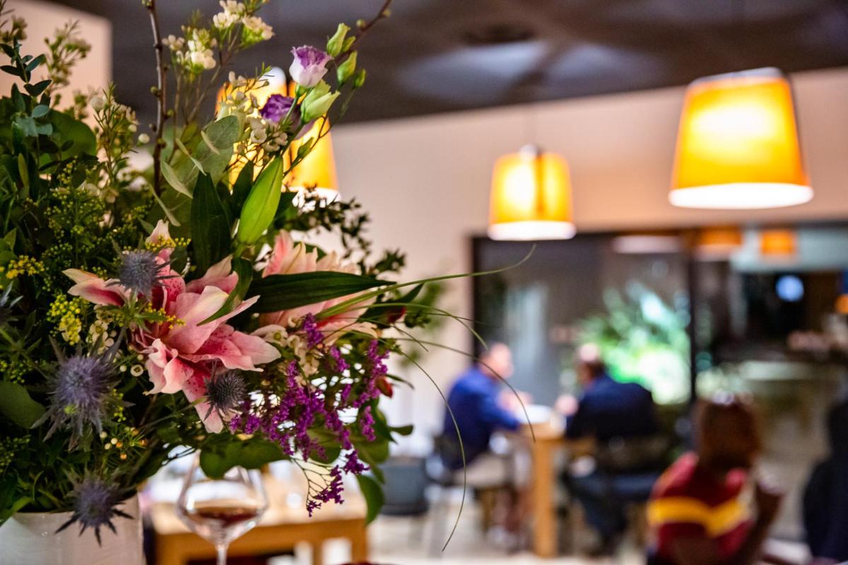 Restaurant ou autre lieu de restauration dans l'établissement Le Domaine de Baulieu, Singuliers Hotels