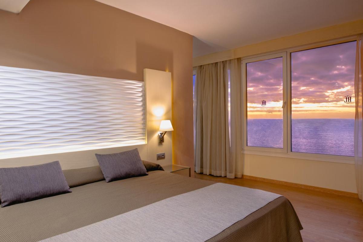 Cama o camas de una habitación en HL Suitehotel Playa del Inglés - Adults Only