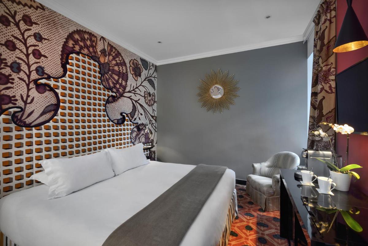 Un ou plusieurs lits dans un hébergement de l'établissement Jules César Hotel & Spa Arles - MGallery Collection