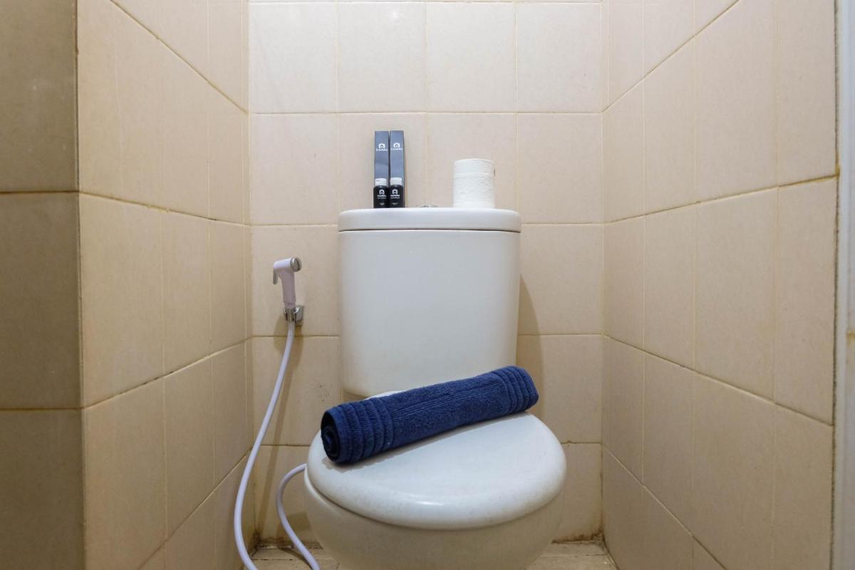 Fully Furnished Studio at Serpong Greenview Apartment By Travelio - Housity