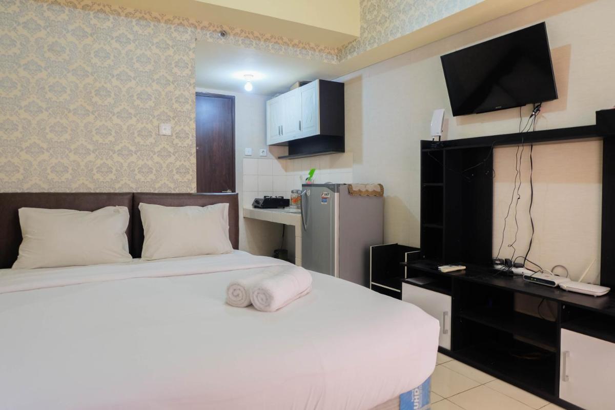 Fully Furnished Studio at Serpong Greenview Apartment By Travelio - Housity