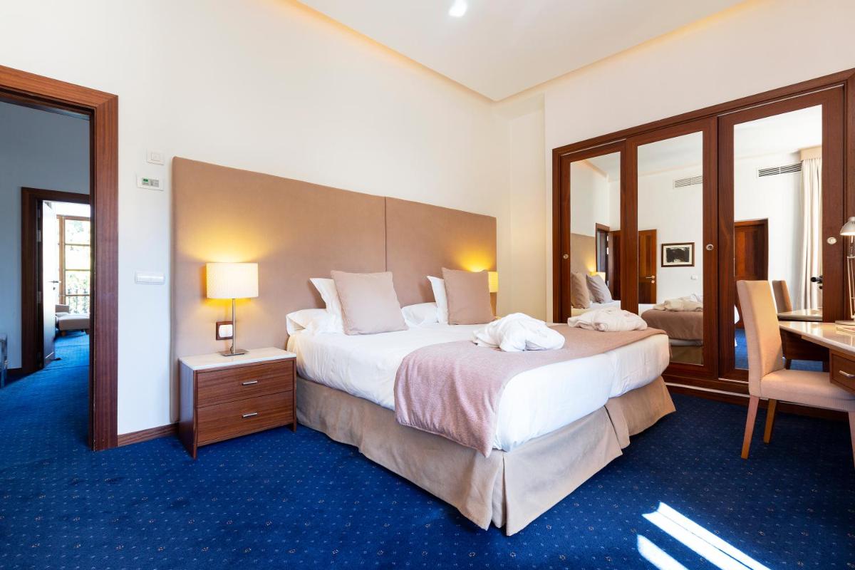 Cama o camas de una habitación en Gran Hotel Soller