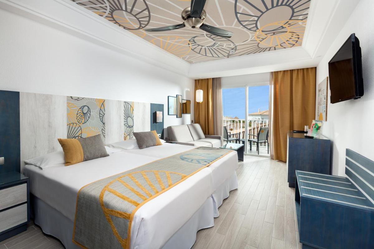 Cama o camas de una habitación en Hotel Riu Chiclana - All Inclusive