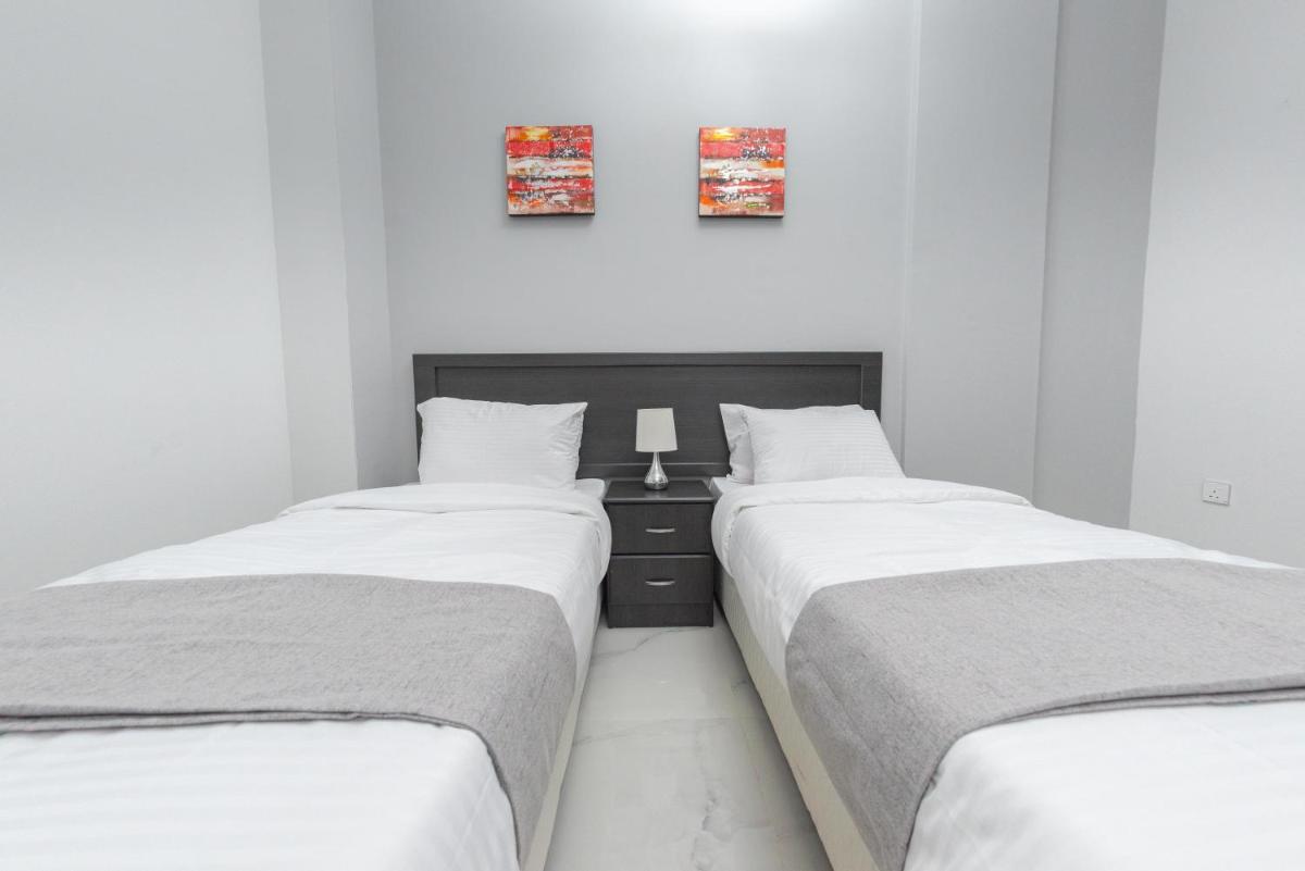 Suitetrails - Al Sqlawi Hotel Apartment