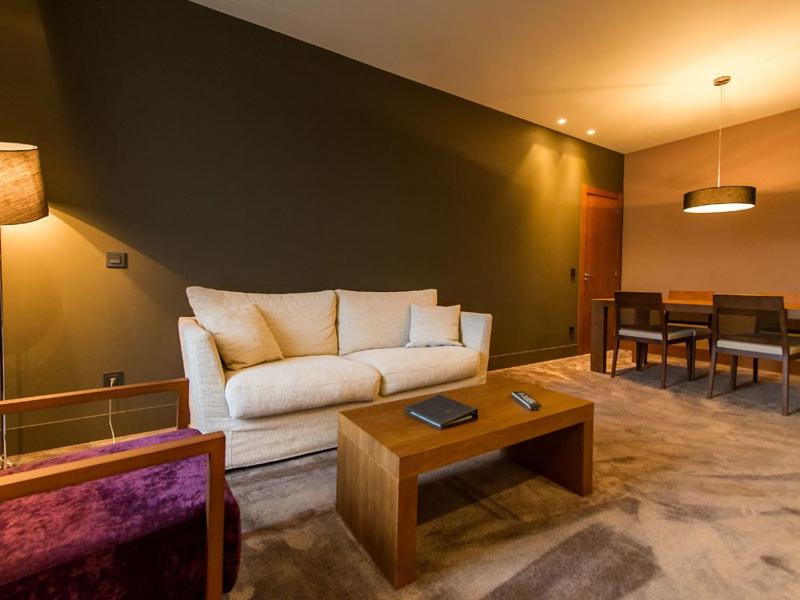 Zona de estar de Blau Hotel Las Caldas