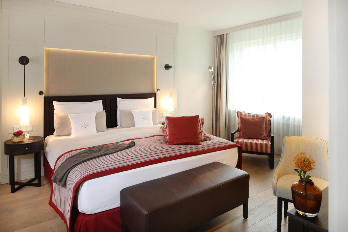 Ein Bett oder Betten in einem Zimmer der Unterkunft Severin's Resort & Spa