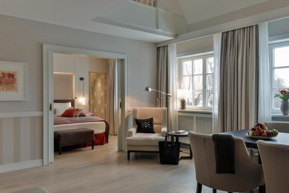 Ein Bett oder Betten in einem Zimmer der Unterkunft Severin's Resort & Spa
