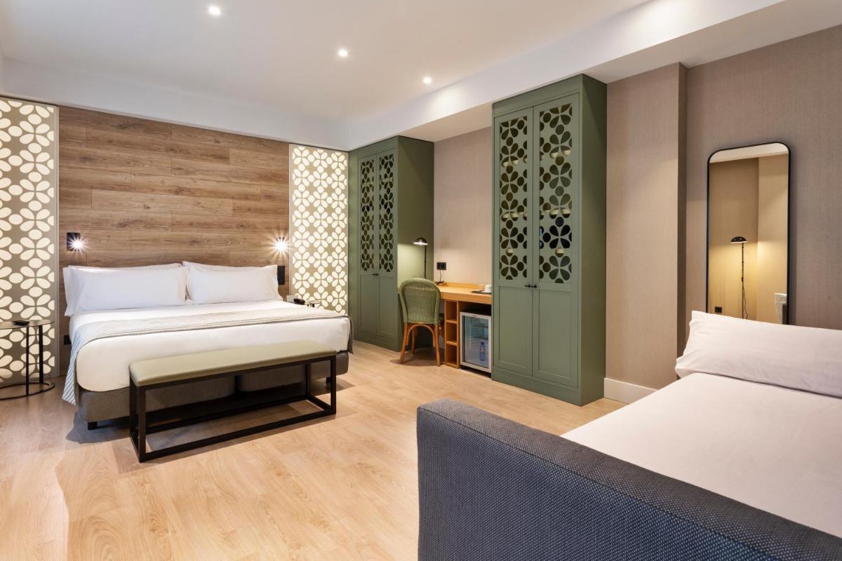 Cama o camas de una habitación en Catalonia Santa Justa