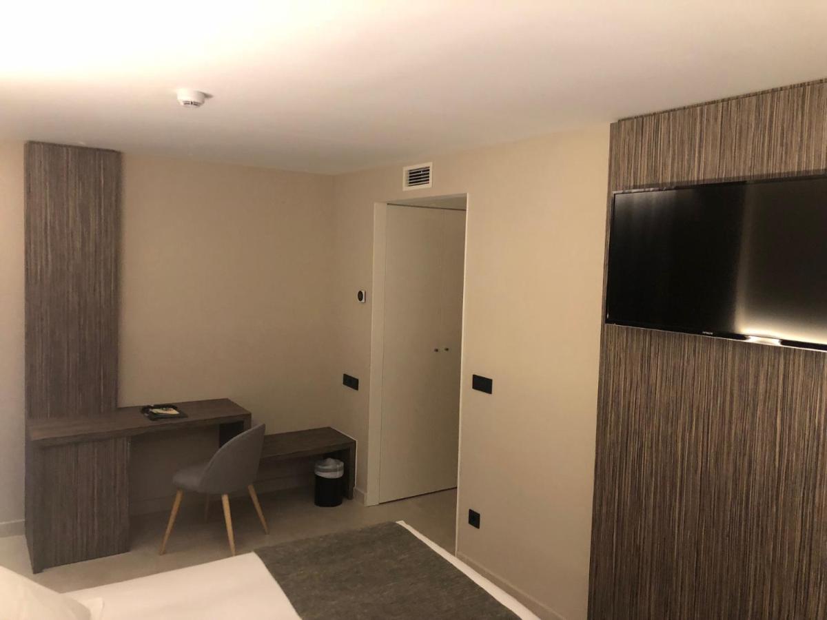 Una televisión o centro de entretenimiento en Hotel Balneario de La Virgen