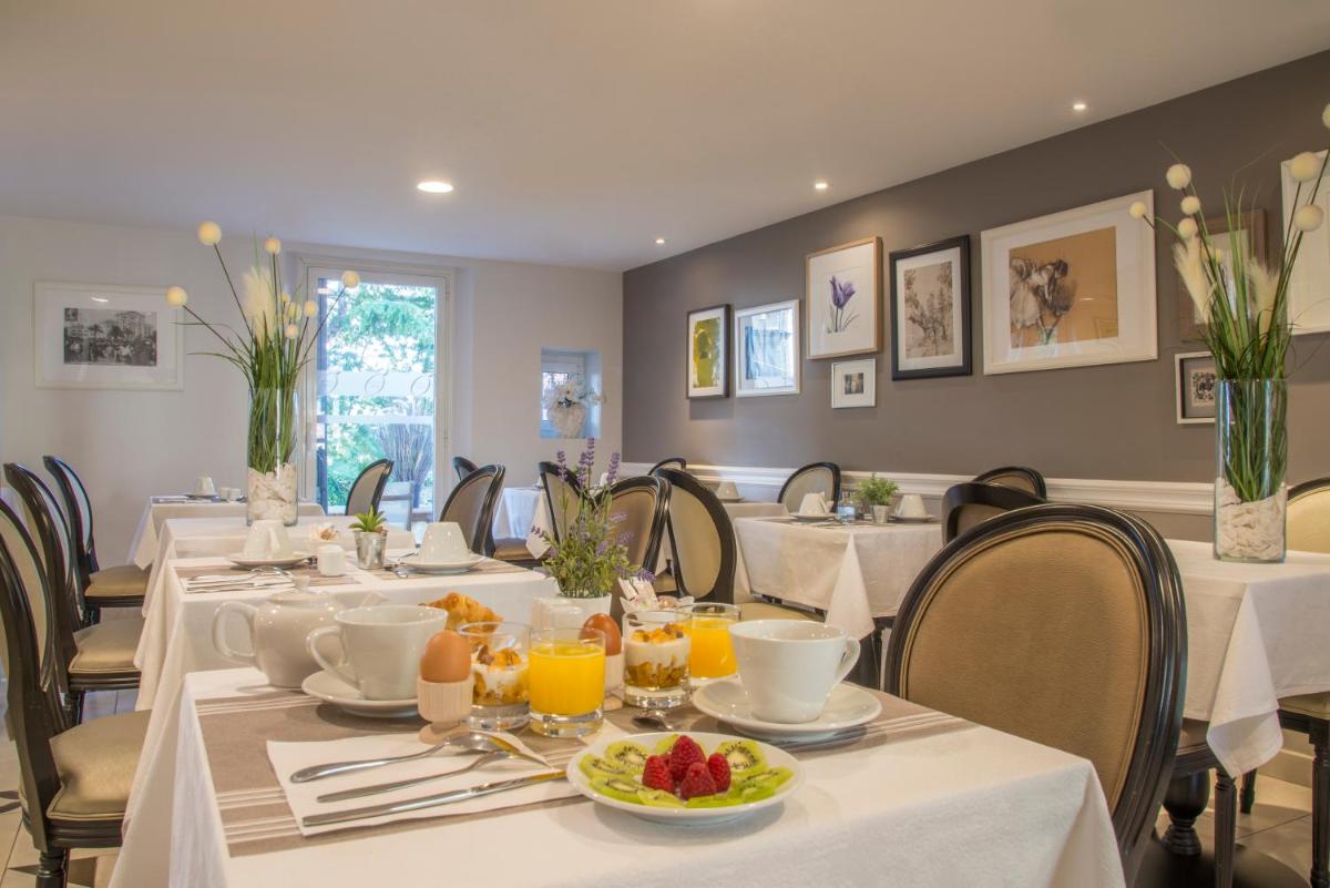 Restaurant ou autre lieu de restauration dans l'établissement La Bastide de l'Oliveraie