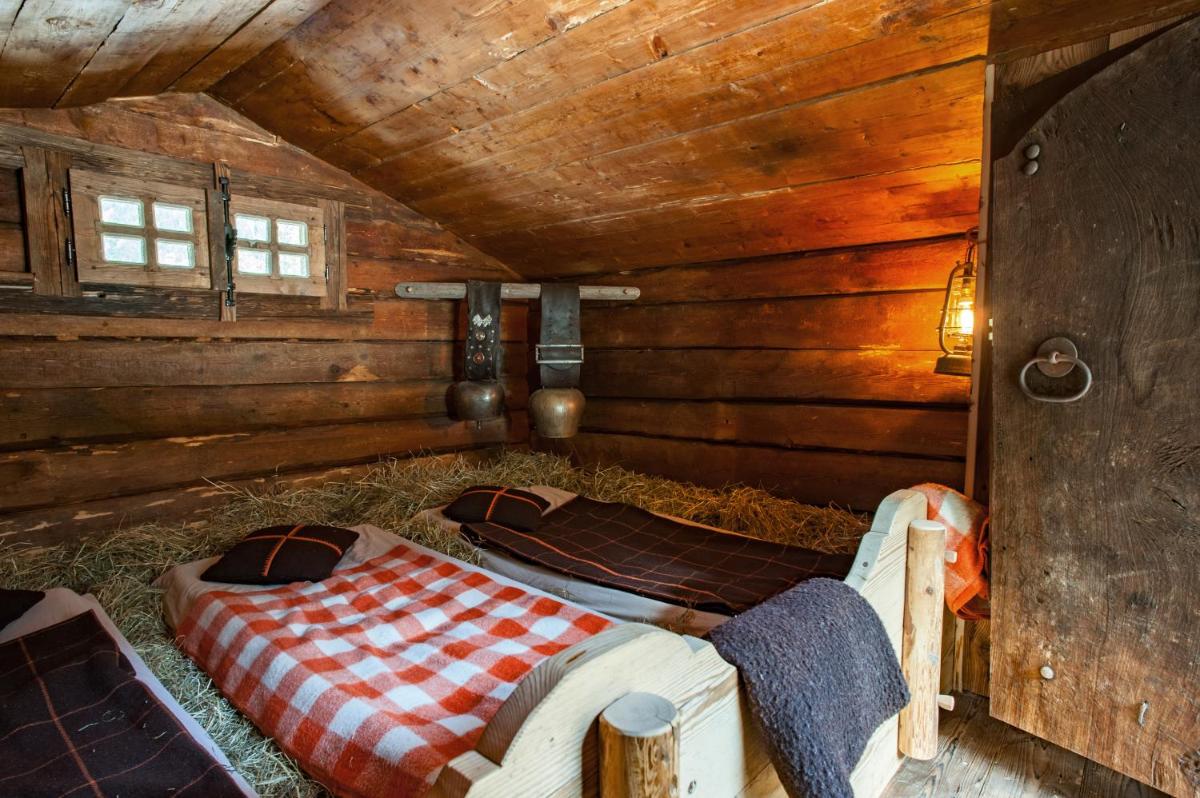 Un ou plusieurs lits dans un hébergement de l'établissement Chalet-Hôtel Hermitage