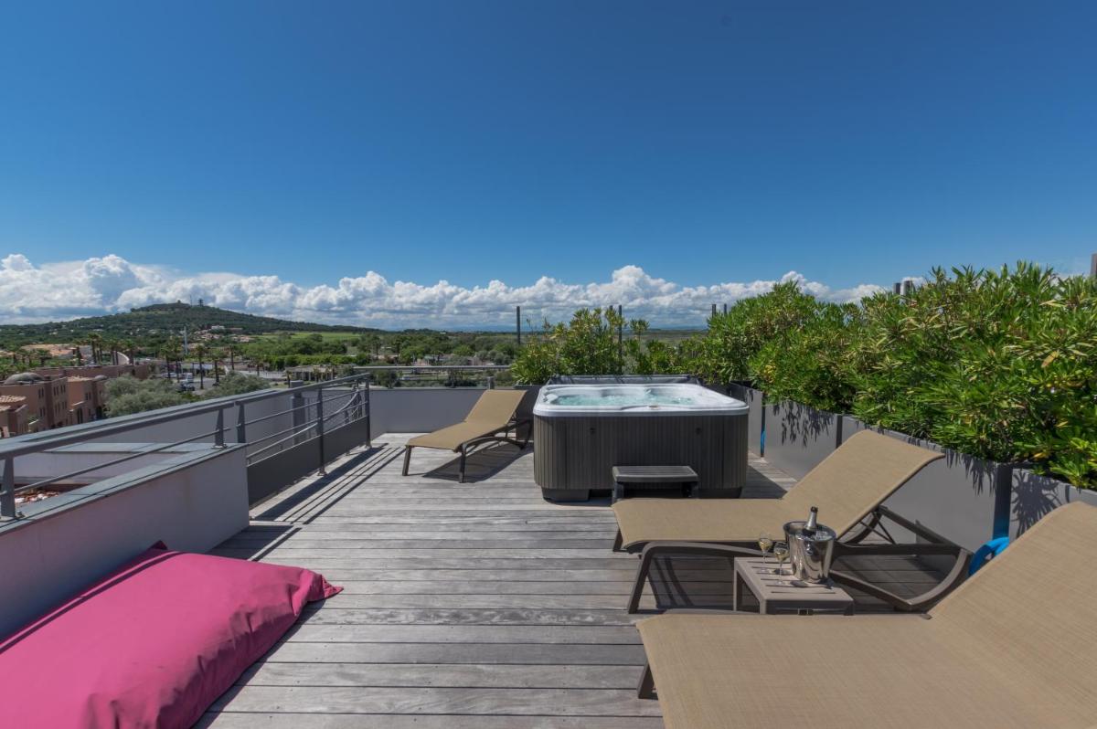 Balcon ou terrasse dans l'établissement Oz'Inn Hôtel & Spa
