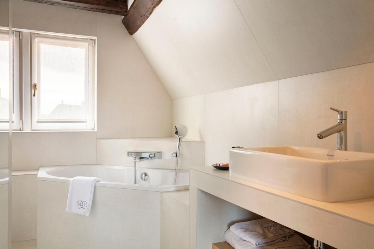 Salle de bains dans l'établissement Relais & Châteaux La Maison Des Têtes