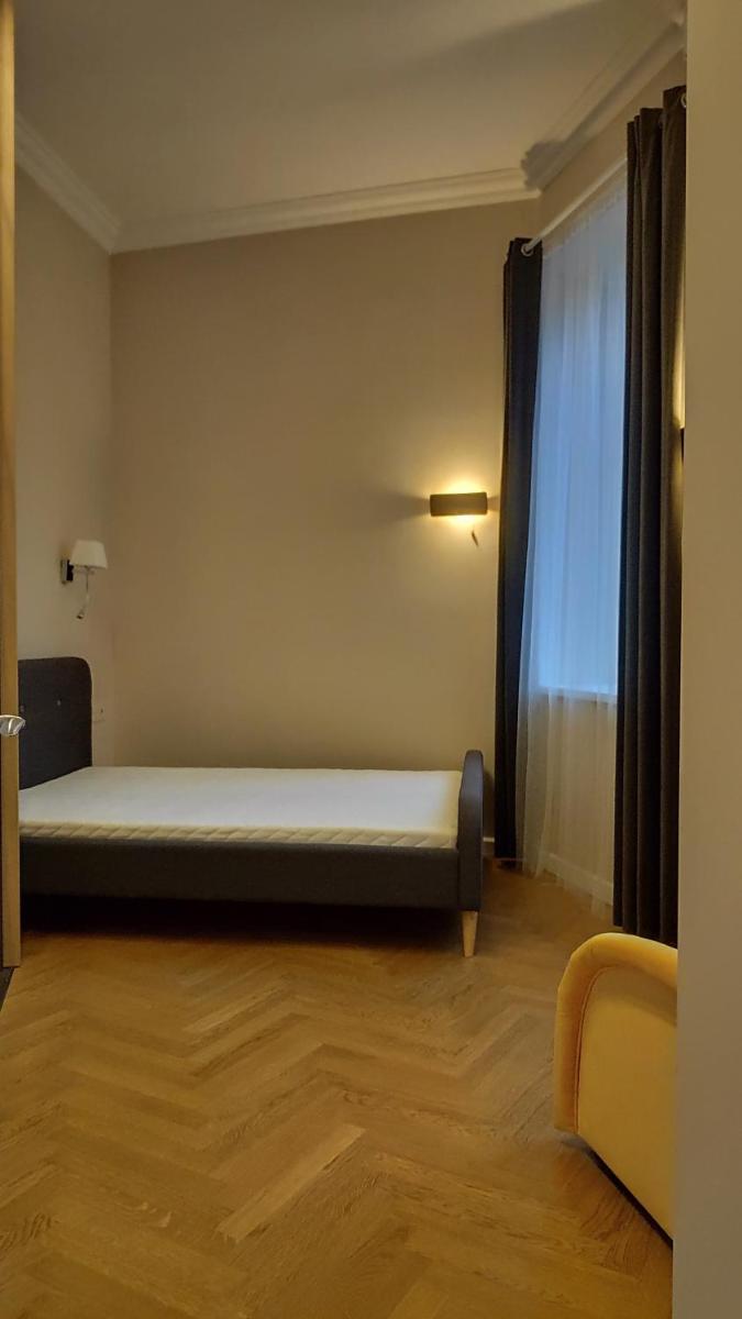 Suitetrails - Cozy Apartment in City Center