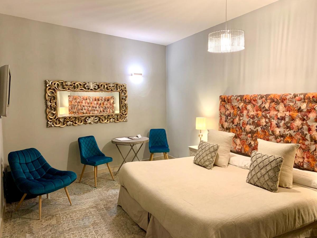 Cama o camas de una habitación en Akla Hotel Mérida