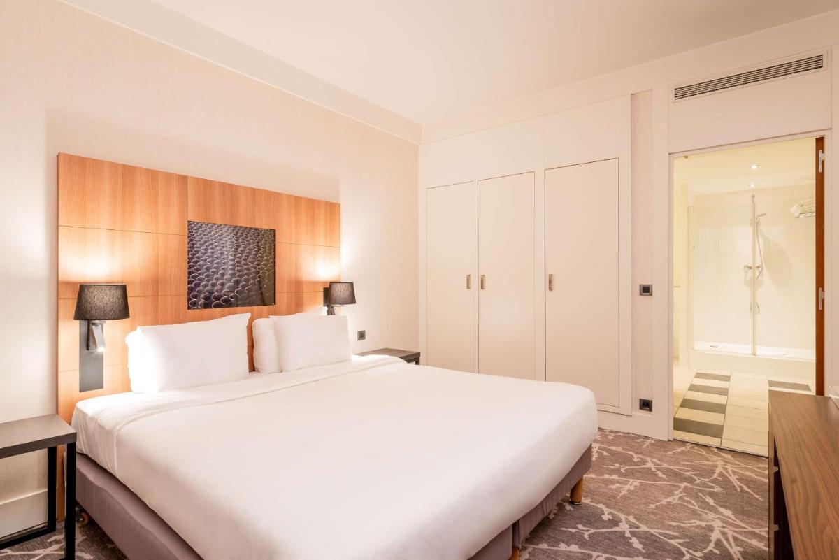 Un ou plusieurs lits dans un hébergement de l'établissement Hotel Paris Marne-la-Vallee by IHG