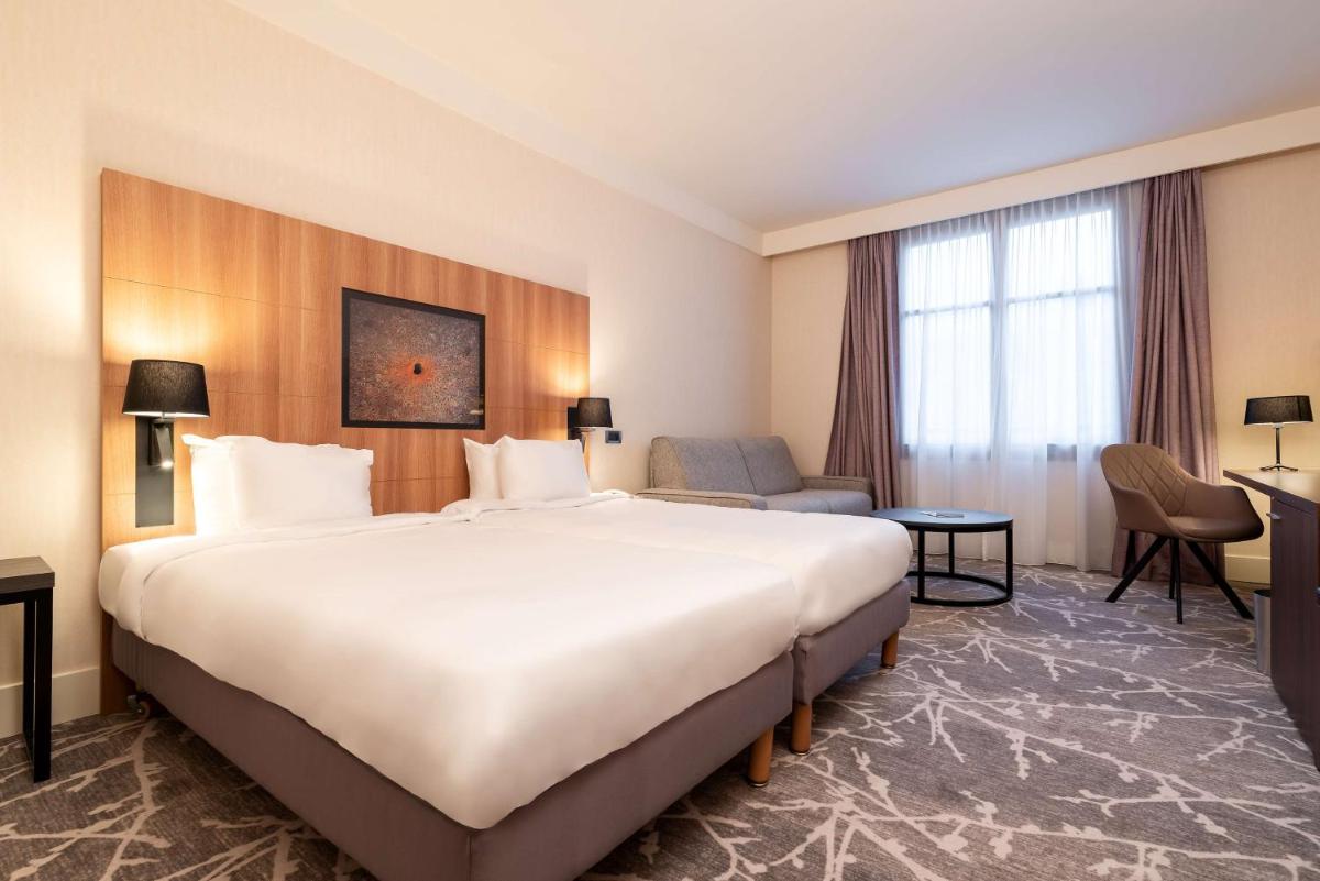 Un ou plusieurs lits dans un hébergement de l'établissement Hotel Paris Marne-la-Vallee by IHG