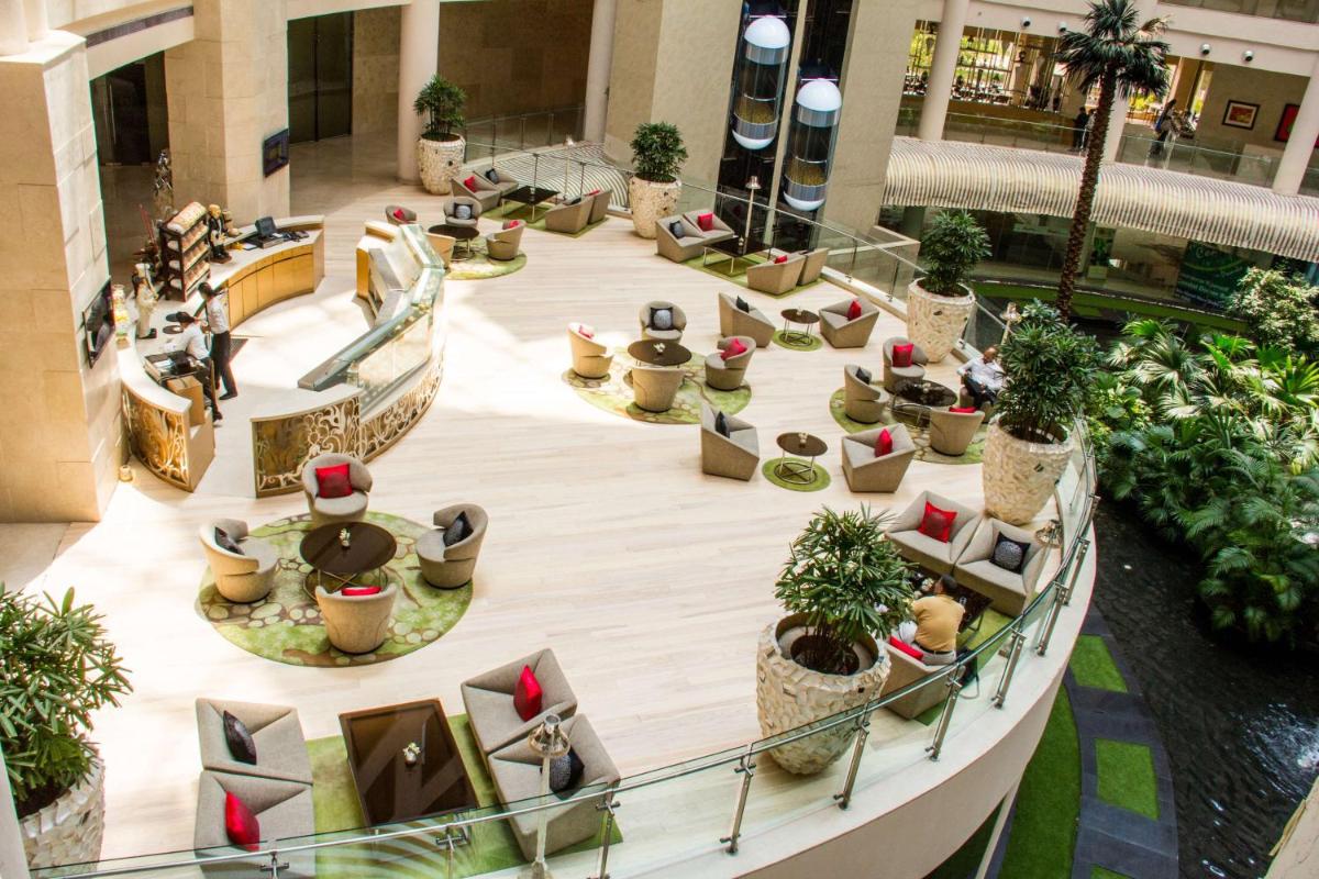 an overhead view of the lobby of a mall at Radisson Blu Hotel New Delhi Dwarka in New Delhi an overhead view of the lobby of a mall at Radisson Blu Hotel New Delhi Dwarka in New Delhi