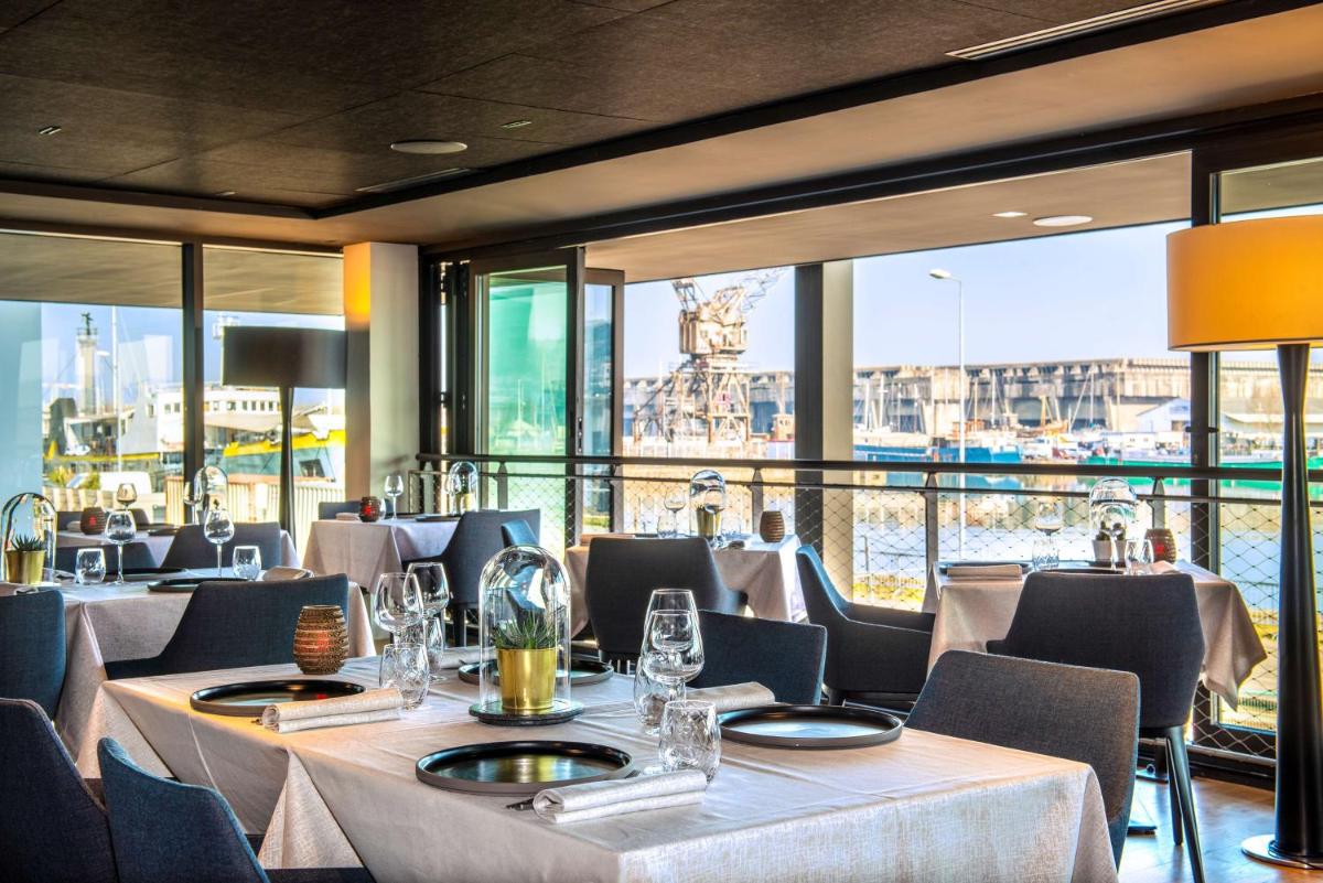 Restaurant ou autre lieu de restauration dans l'établissement Radisson Blu Hotel Bordeaux