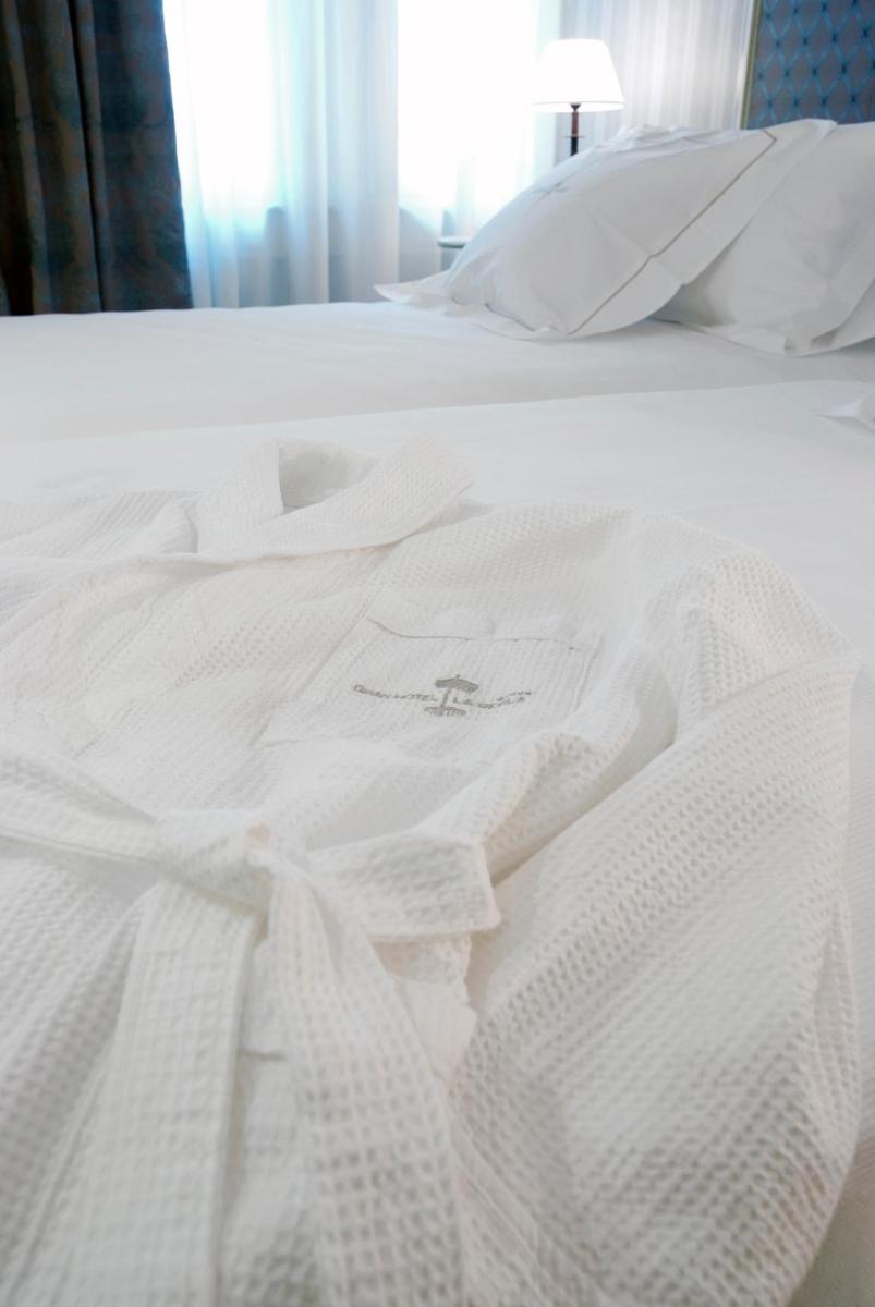 Cama o camas de una habitación en Gran Hotel La Perla